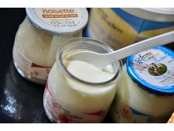 Jars of dairy products at the Cheese and Dairy Products Fair